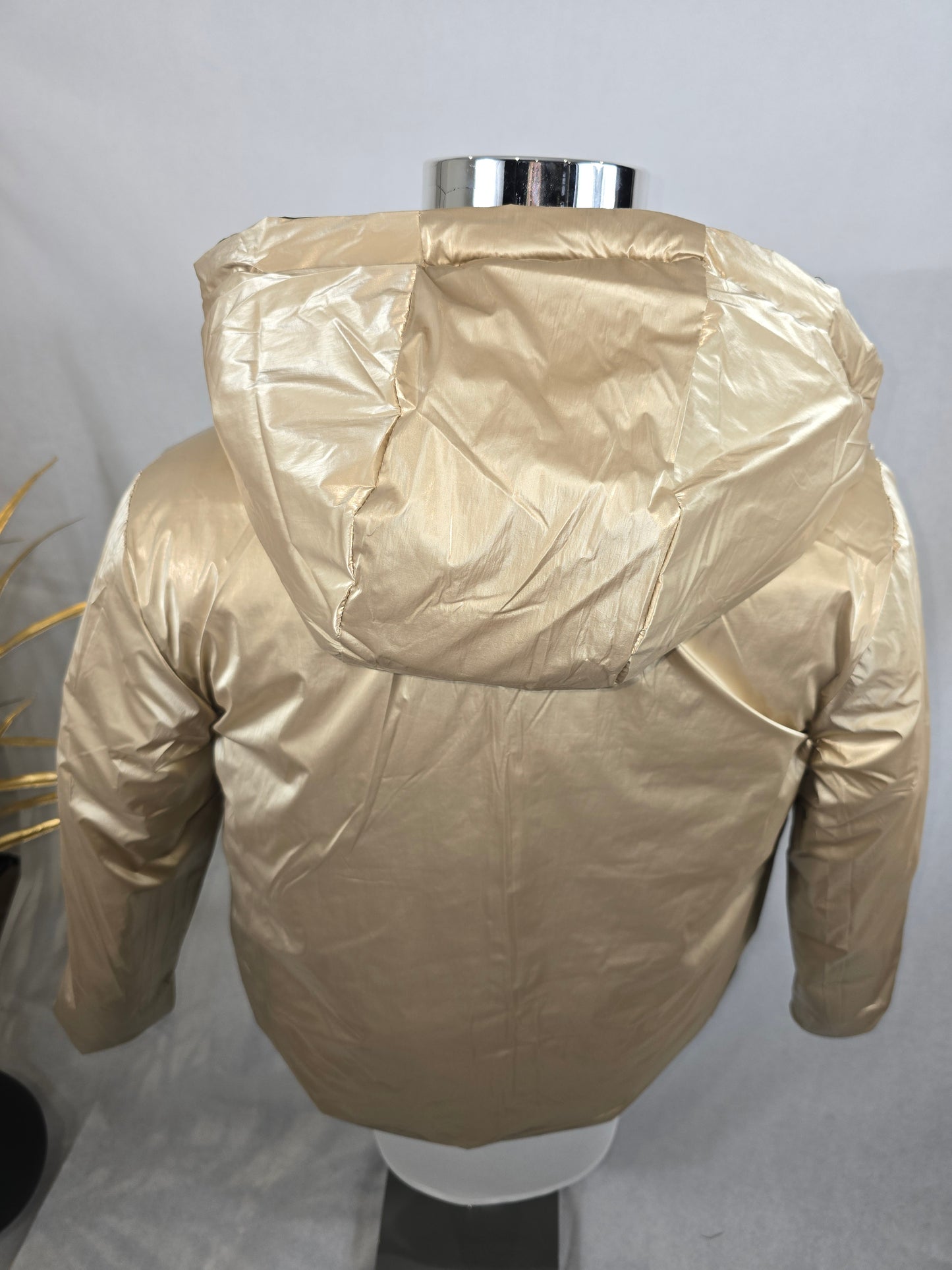 Veste réversible verte et dorée avec capuchon