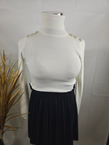 Pull col roulé