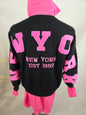 Pull "NEW YORK" noir avec écriture rose